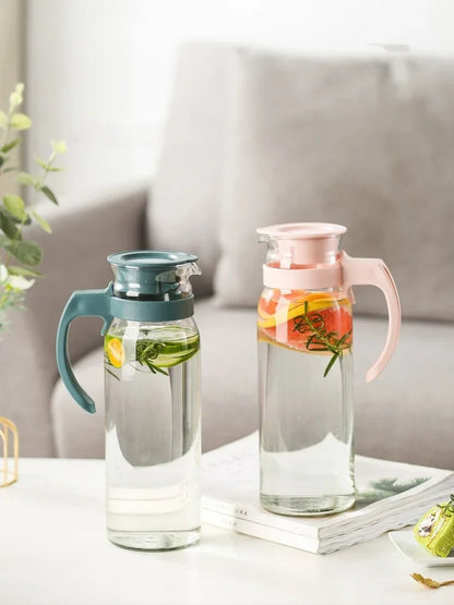 Pichet en verre résistant à la chaleur avec couvercle et poignée