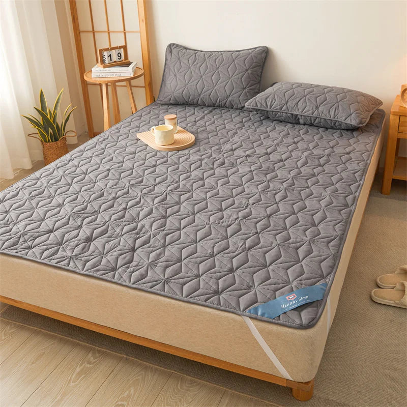 Surmatelas imperméable matelassé pour lit simple et double 140/160