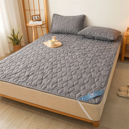 Surmatelas imperméable matelassé pour lit simple et double 140/160