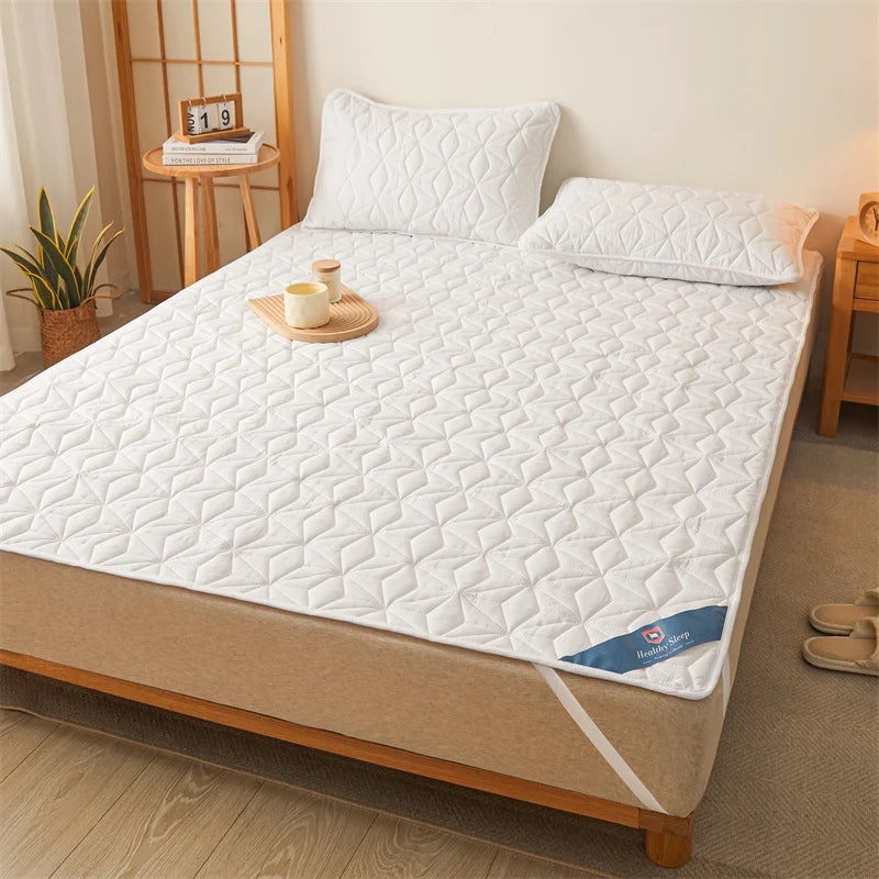 Surmatelas imperméable matelassé pour lit simple et double 140/160